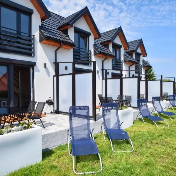 Domki Apartamentowe AURA, ξενοδοχείο σε Grzybowo