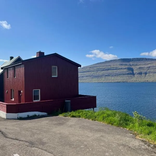 Hósvík에 위치한 호텔 The Cozy red house with Amazing sea view