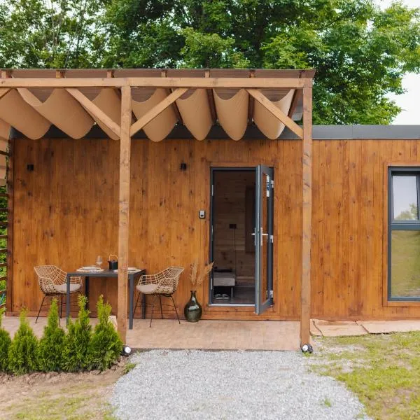 Tiny Heaven Cabin, מלון בPoiana