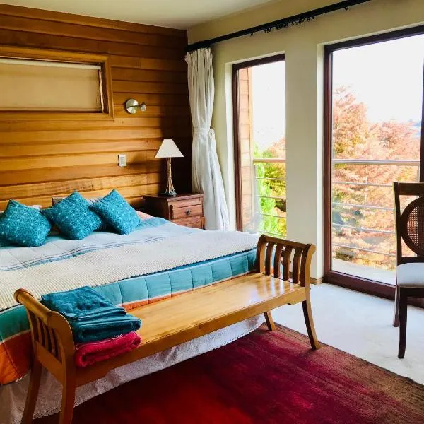 Suite abierta todo el año con vistas al campo, lago y ciudad, hotel v mestu Puerto Varas