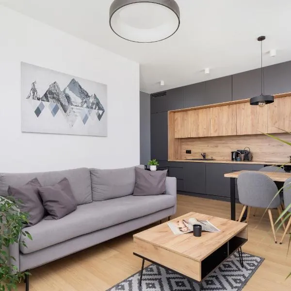 Modern & Spacious Apartment with Air Conditioning & Parking by Renters Prestige, hotel di Kraków