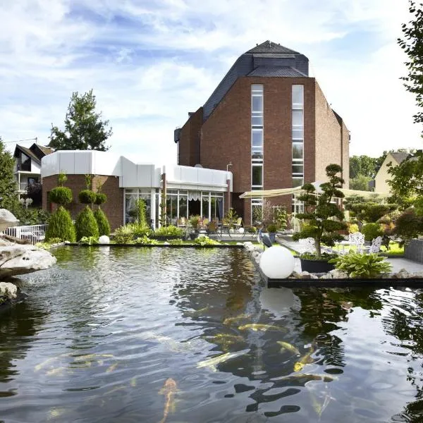 Rheinhotel Larus, hotel en Isenburg