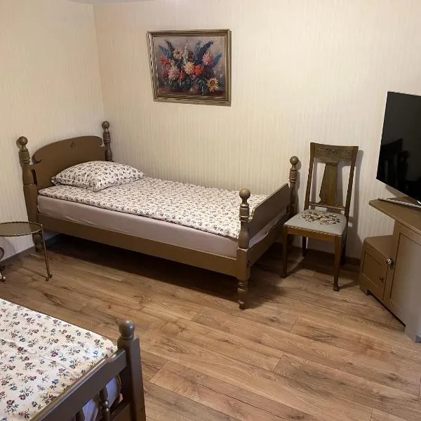 Arbatinės apartamentai - Močiutės namelis, hotel em Biržai