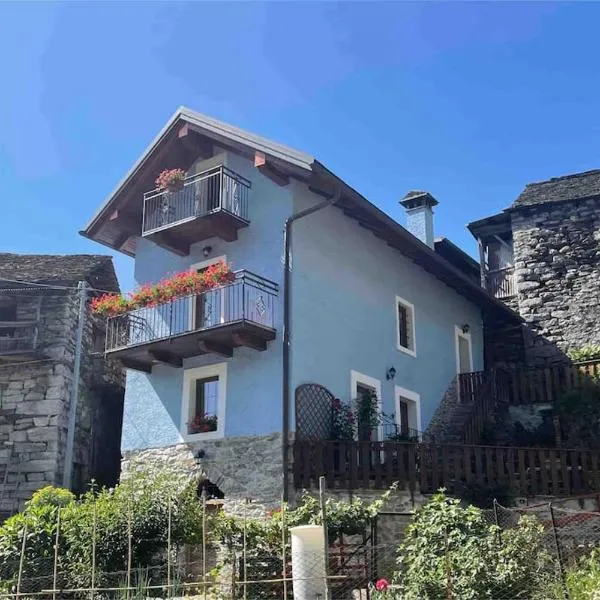 CASA DEL CIOS calda e intima casetta immersa nel verde delle montagne, hotel in Vigino