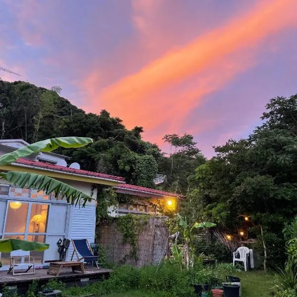 Guesthouse Papaya, hotel i Shimoda