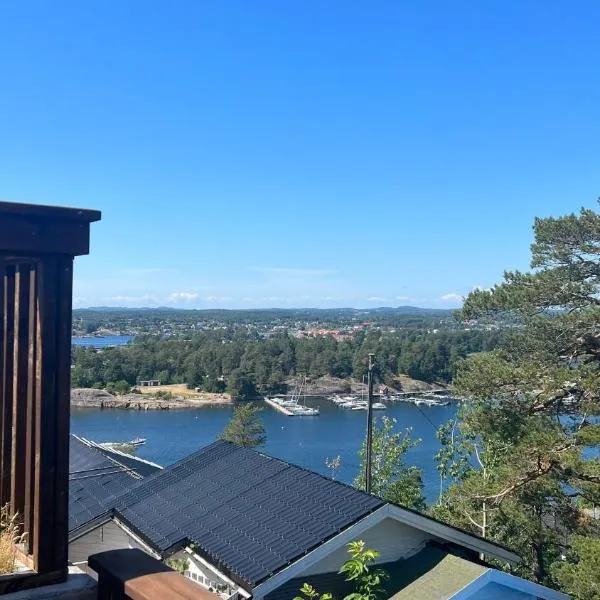 Moderne Leilighet med panorama utsikt check -In 24 h, готель у місті Саннефіорд