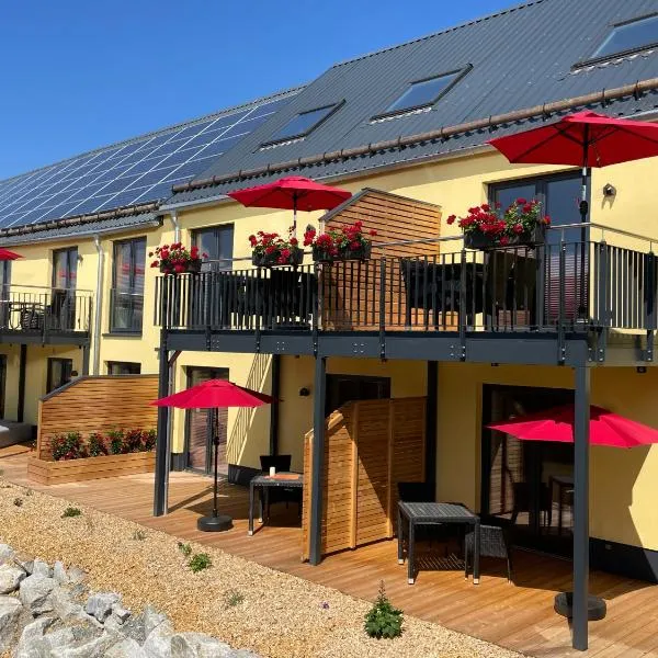 Ferienwohnung im Chaletstil Giebeltraum 115 qm Wellness Fitness Sauna Bergrödelhof, khách sạn ở Feilitzsch