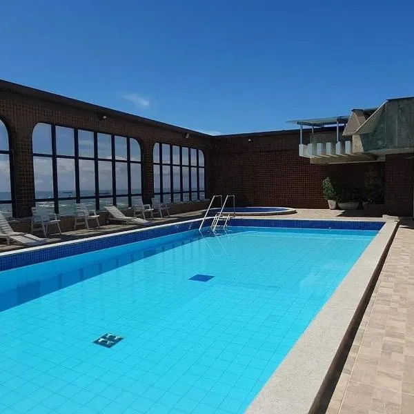 Recanto Maravista apto Frente Mar 2 quartos 2 banheiros, AR, WI FI, Piscina, hotel in Vila Velha