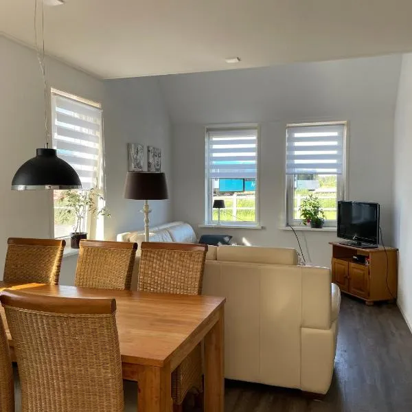 Heerlijk hoek appartement net buiten het dorp, hotel in Buitenpost