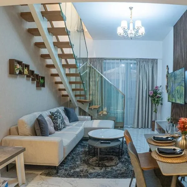 Darkwood Haven - Luxe 2BR Duplex Stay in Oasis, Near Masdar City, hotel in Abu Dhabi