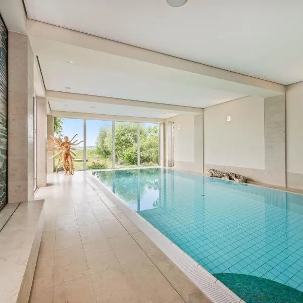Wellness-Apartment mit Wasserblick, Pool, Sauna & Fitnessbereich、Rankwitzのホテル