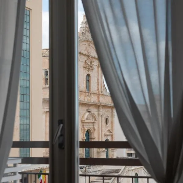 Central House palazzo Brafa una camera di albergo, hotel v destinaci Ispica