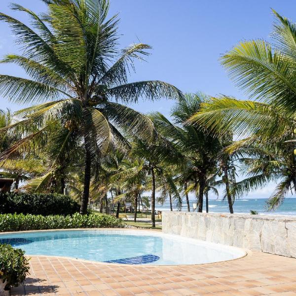 Casa para 16 pessoas pé na areia com garagem na Praia de Guarajuba, BA
