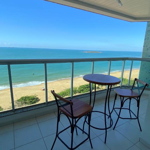 Flat frente para o mar