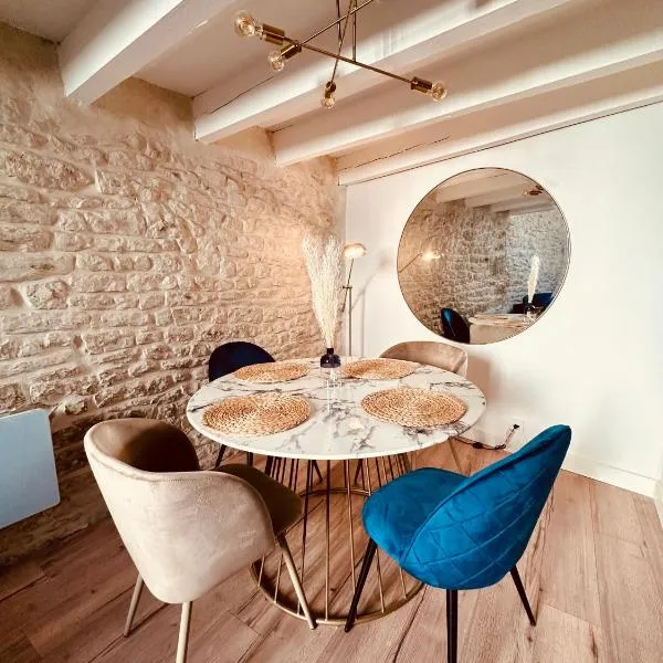 Duplex à 2 min des arènes et de la maison carrée, hotel in Nîmes