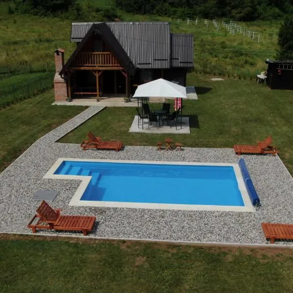 Vikendica sa bazenom MAGNUM, hotel en Višegrad