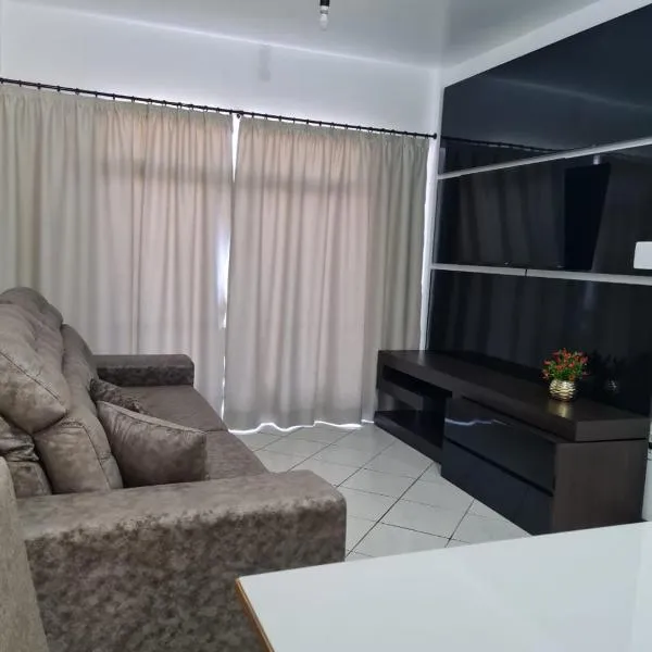 Apartamento com mobília nova 101!, hotel in Verê