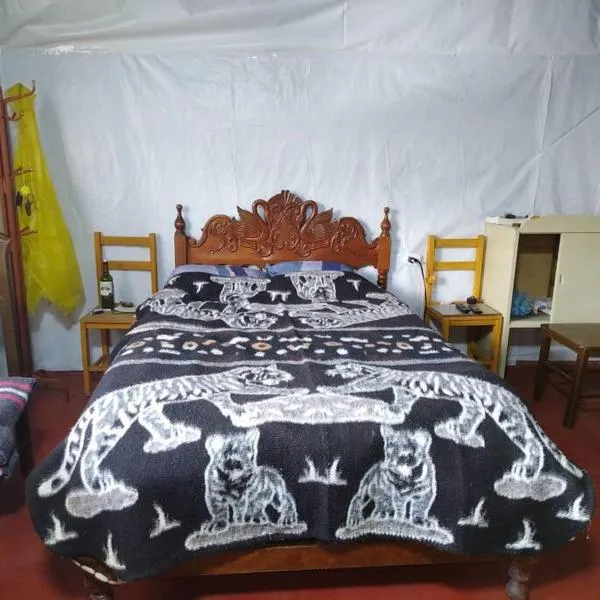 Posada Shumac Ñahui baño privado y ducha caliente โรงแรมในอัวรัซ