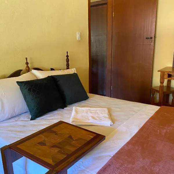 Casa dos Coqueiros - Cama, Café e Eventos, hotel in Itabirito