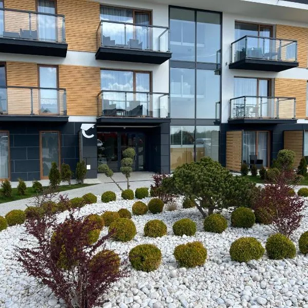 Apartments Deluxe BALTIN FAMILY animacje i 2 baseny w cenie, hotel in Sarbinowo