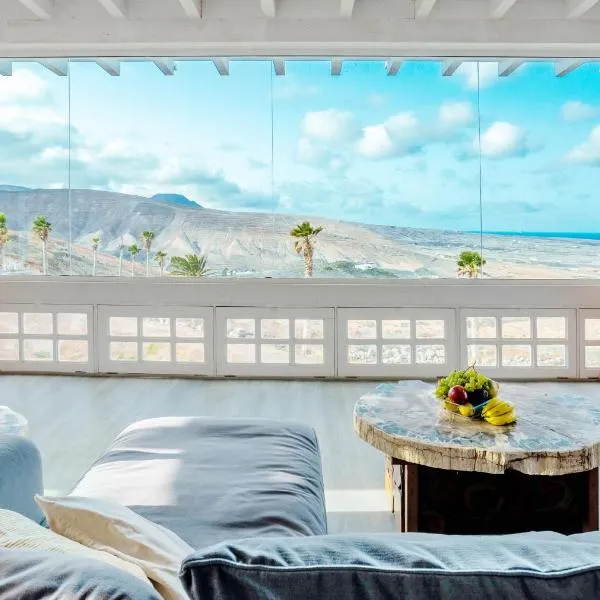 Eco Vineyard Cottage - Fantastic Views - 5 mins drive to Arrieta beach，位于Tabayesco的酒店