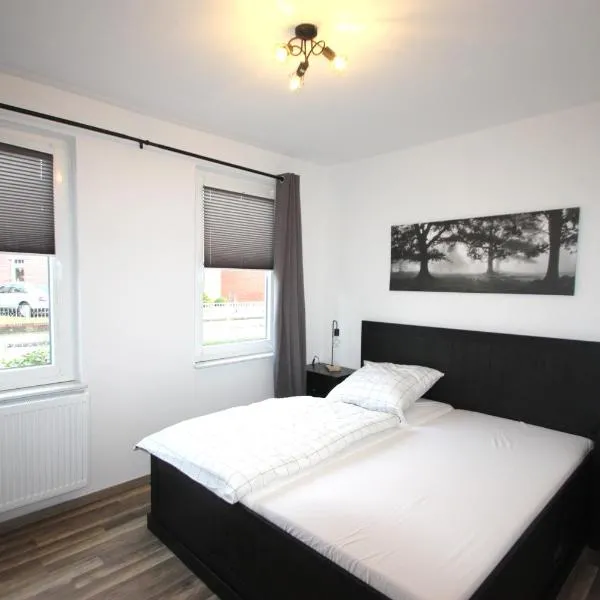 Moderne Ferienwohnung mit Terrasse & Garten Möwennest III, hotel em Emden