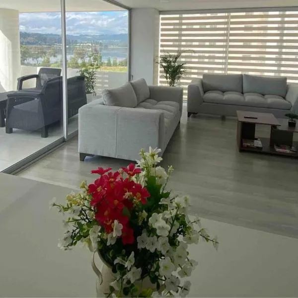 Apartamento con vista al lago., hotel in Paipa