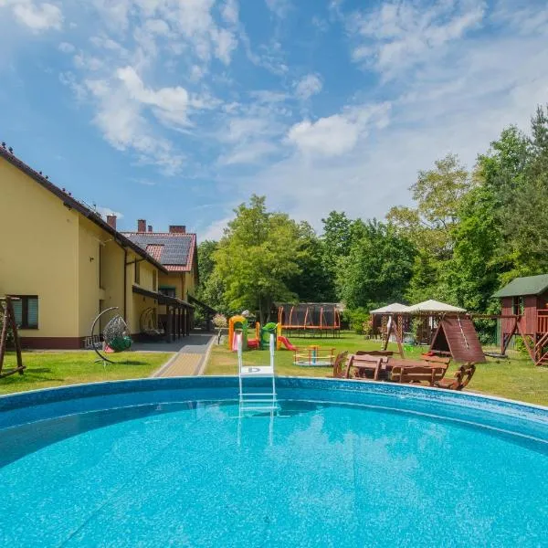 Apartamenty Gajówka- rowery, plac zabaw, sauna, jacuzzi – hotel w mieście Junoszyno