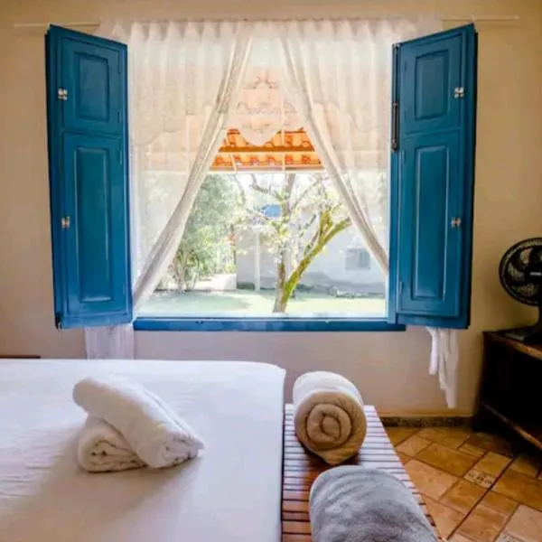 Casinha aconchegante em meio a natureza, hotel in Rio Acima