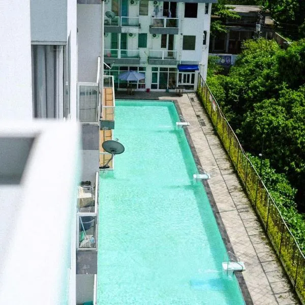 Bernaung V Apartment: Seturan şehrinde bir otel