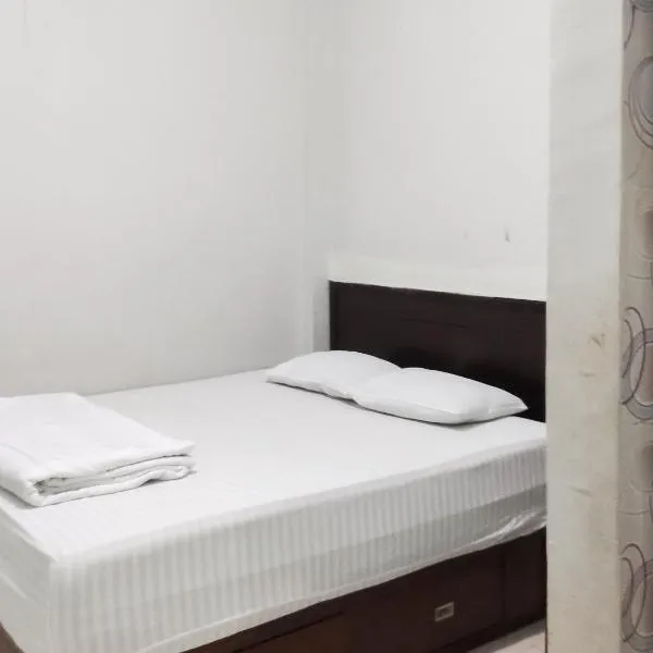 RedDoorz Syariah near Terminal Terpadu Langsa, hotel v destinaci Birimpontong
