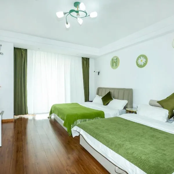 Dalian Hong Xi Yuan Apartment Wanda Plaza, hotel v destinaci Dalian