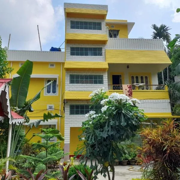 Balurghat Hotel KOKORO Farmhouse, hôtel à Bālurghāt