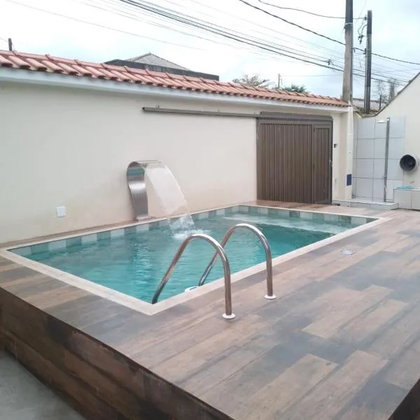 Casa espaçosa com Piscina e Churrasqueira 2 dorm, hotel in Guarujá