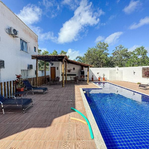 Apê pavimento superior com 3 quartos com ar condicionado, varanda e suite com vista para a piscina e internet privativa, a poucos metros da Praia de Taperapuã. Residencial Jardins de Taperapuã, condomínio com piscina, 2 vagas de garagem e área gourmet - Foto 4