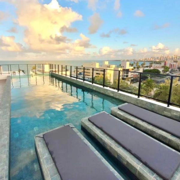 Flat completo - Até 2 Pessoas - Unidade com Jacuzzi privativa e área comum com visão para o mar