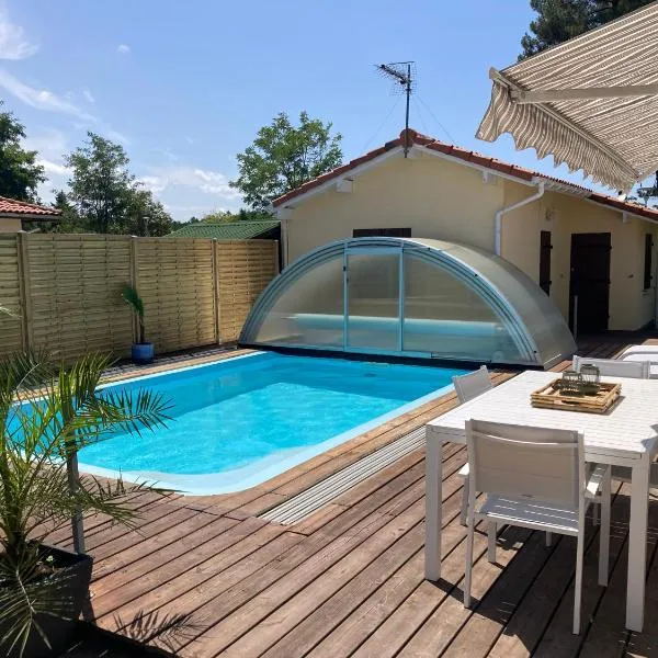 !Villa 4*MiMiZaN/Piscine chauffée/Wifi/Plage à 5mn/Clim, Hotel in Mimizan