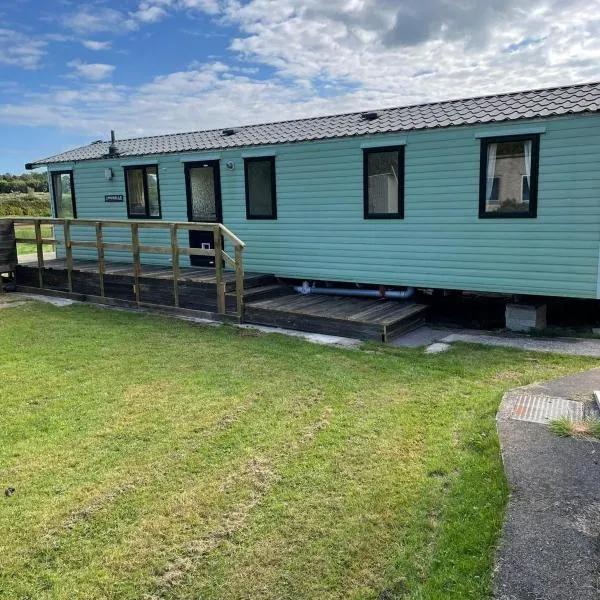Garej Mynytho Caravan, hotel a Pwllheli