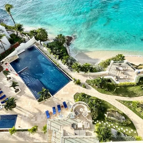 Beachfront luxury 2br condo, hotel a Lowlands
