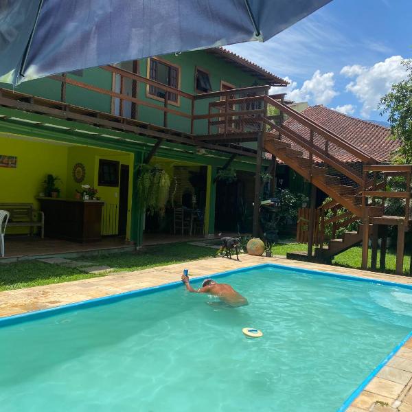 Pousada Casa de mãe aconchegante com piscina próximo à praia