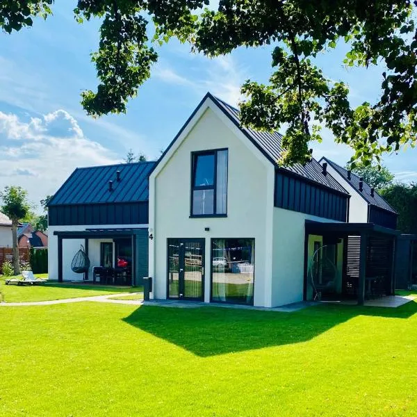 Domki Villa Hoff Resort, hotel v destinaci Trzęsacz