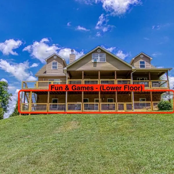 Fun & Games by HoneyBearCabins 2BR/1BA Sleeps 7, hotel in Sevierville