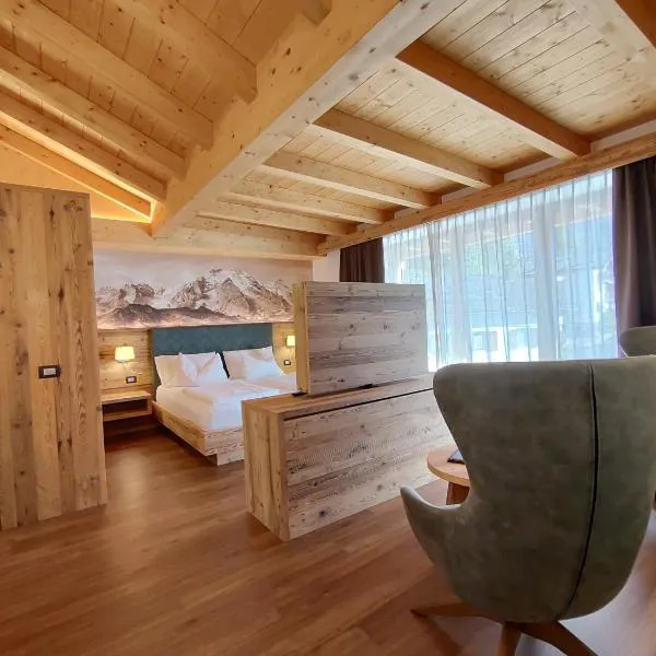 DOLOMITES B&B - Suites, Apartments and SPA, hotelli kohteessa Tesero