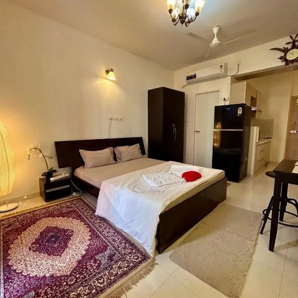 Good Stay Pool view stylish Studio Apartment,6km from Airport, 307, hotel in Dabolim