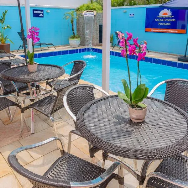 Pousada Sol da Enseada Guarujá Inn - Piscina Aquecida, hotel in Guarujá