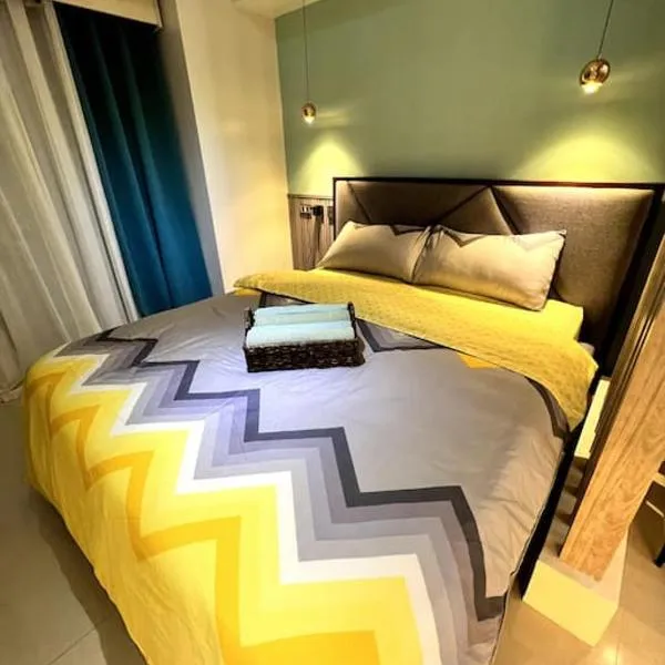 1BR Condo beside Abreeza Mall, Davao City with 200 mbps WI-FI speed, hotel in Davao City