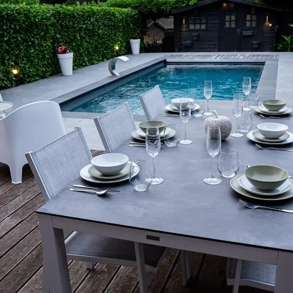 Chez Sabine et Eric Maison pour 6 personnes avec piscine chauffée, hotel v destinaci Andenne