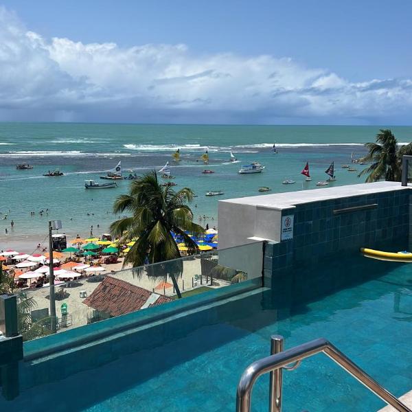 Flat a beira mar Porto de Galinhas pé na areia