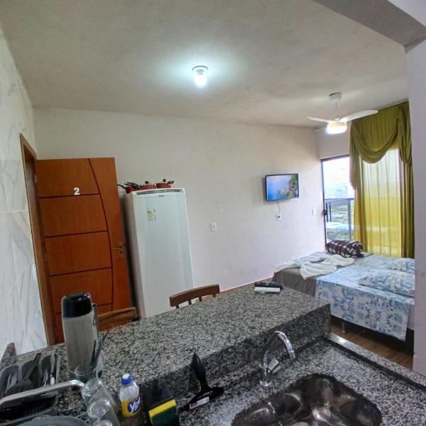 FLAT 2 COM AR CONDICIONADO E VARANDA- Avenida Hospedagem