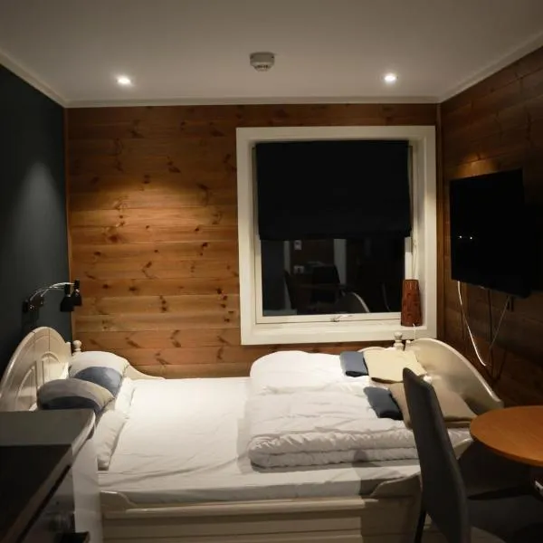 Fossheim Lodge - komfortabel minileilighet, hotel in Eikregardane